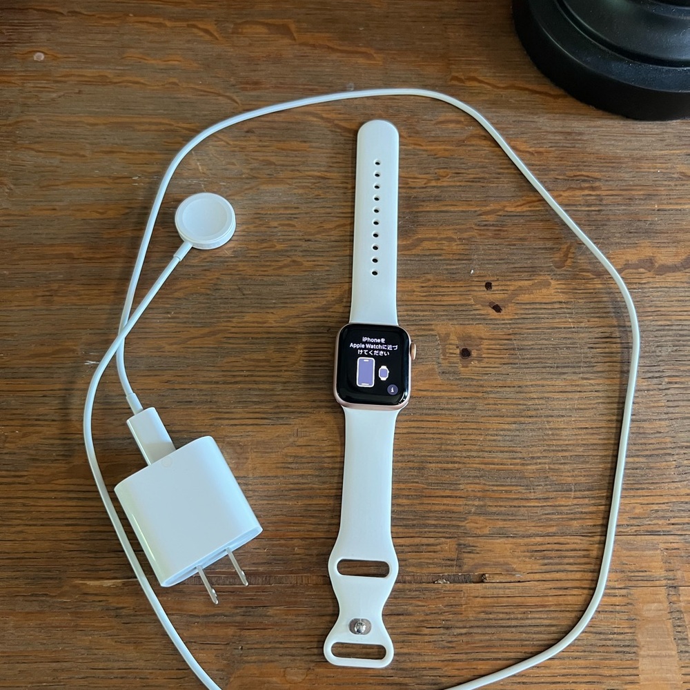 Apple Watch SE 40 MM Smartwatch with White Band, charging cord and charging box